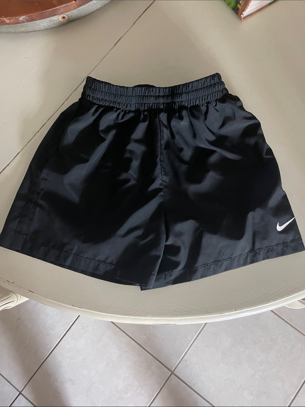 Nike Women's Black Athletic Running Shorts with White Swoosh